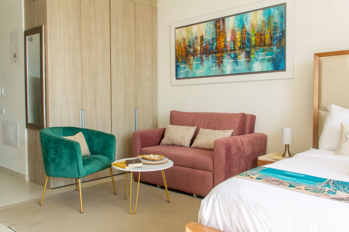 Macondo living area with a sofa bed and Caribbean decor